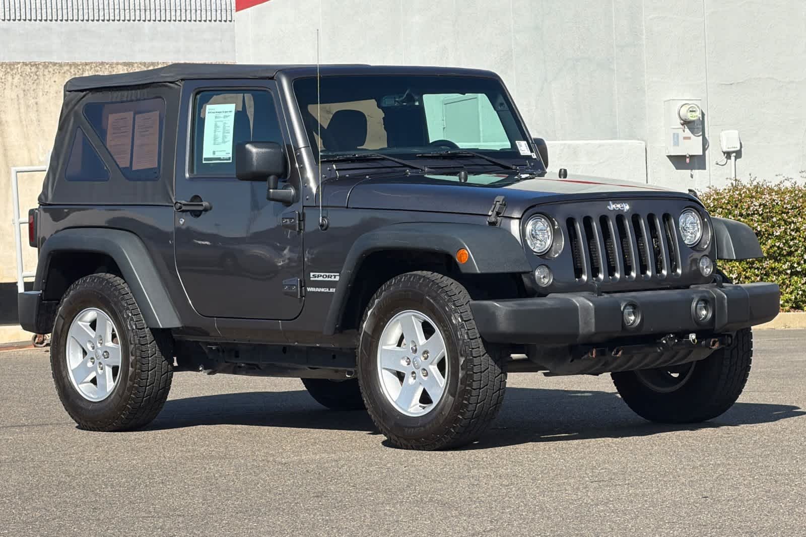 Used 2018 Granite Crystal Metallic Clearcoat Jeep Sport S image 5