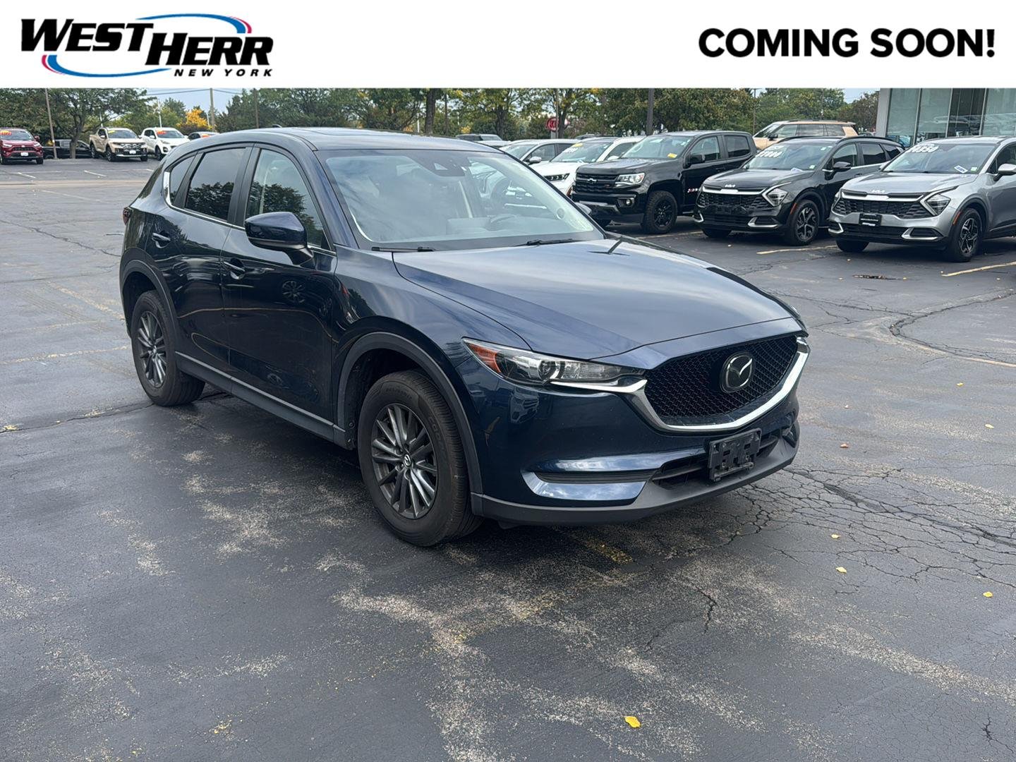 Used 2021 Deep Crystal Blue Mica Mazda Touring image 1