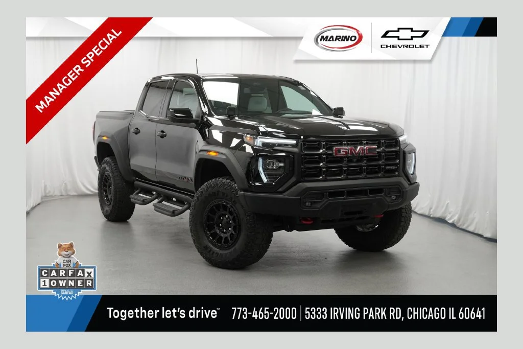 Used 2024 Onyx Black GMC AT4X image 1
