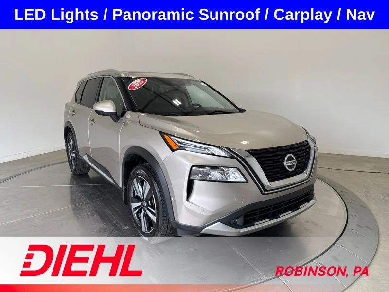 Used 2021 Gold Nissan Platinum image 1