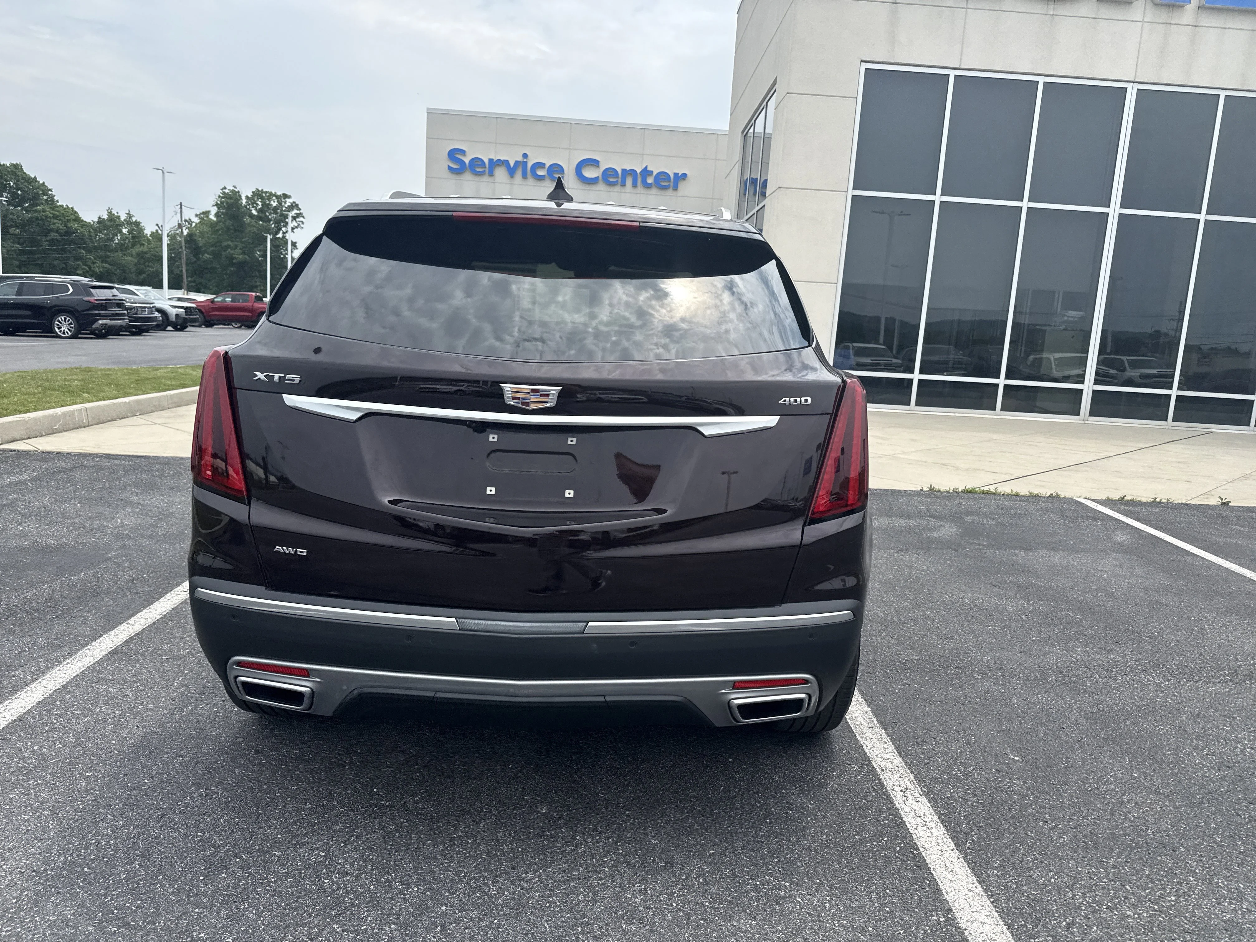 Used 2021 Garnet Metallic Cadillac AWD Premium Luxury image 4