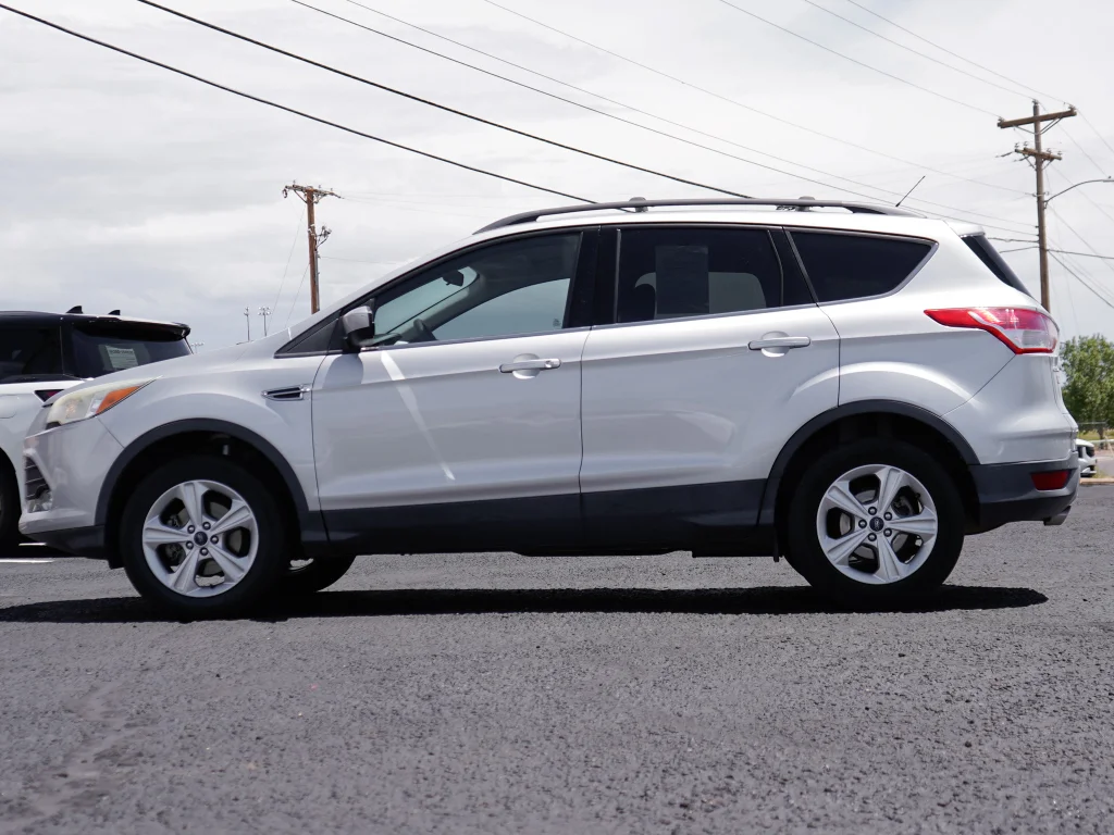 Used 2016 Ruby Red Metallic Tinted Clearcoat Ford SE image 5