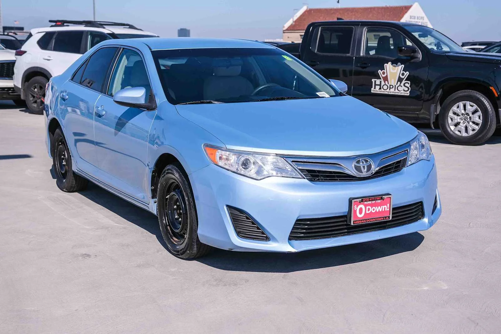 Used 2013 Clearwater Blue Metallic Toyota LE image 3