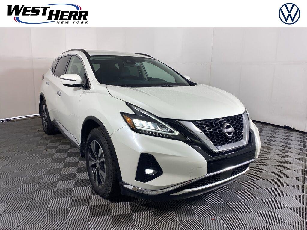 Used 2024 Pearl White Tricoat Nissan SV image 1