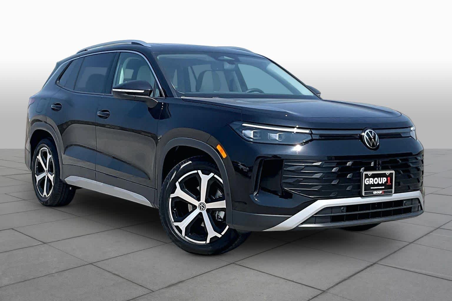 New 2026 Deep Black Pear Volkswagen 2.0T SE image 2