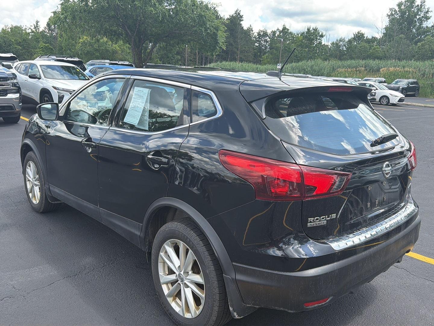 Used 2018 Magnetic Black Nissan S image 4