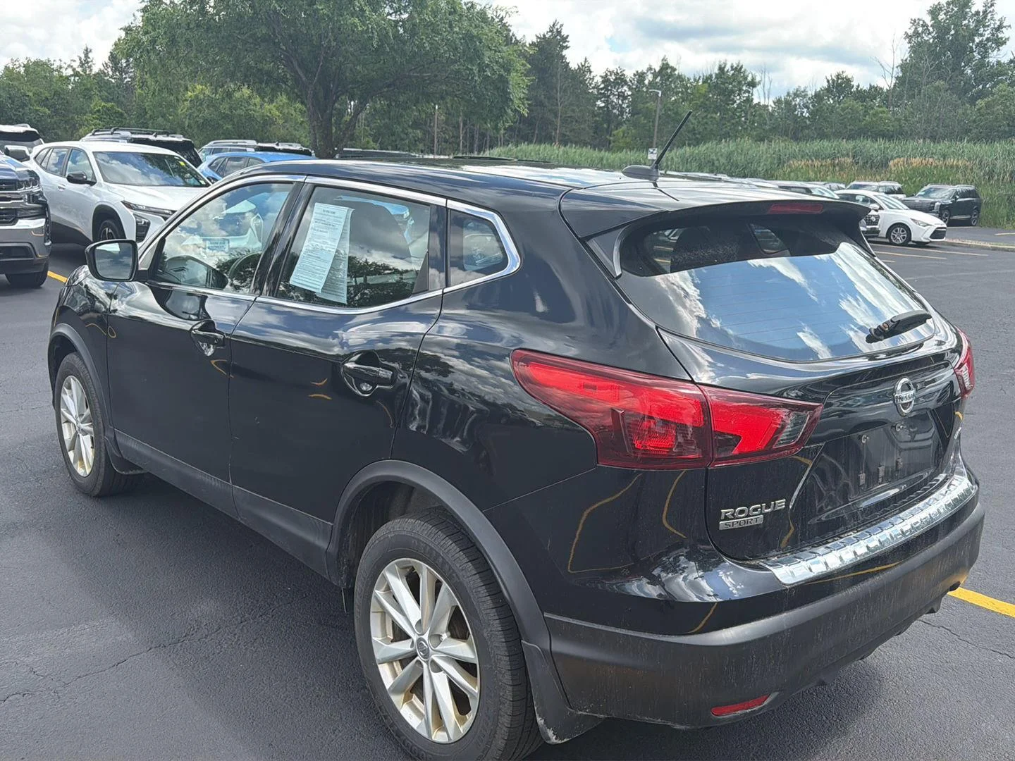 Used 2018 Magnetic Black Nissan S image 4