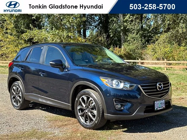 Used 2016 Deep Crystal Blue Mica Mazda Grand Touring image 1