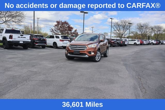 Used 2017 Ford Escape Titanium with VIN 1FMCU9J92HUA07972 for sale in Orchard Park, NY