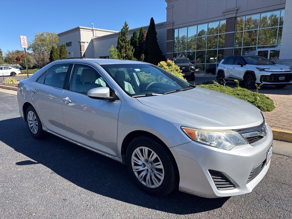 Used 2014 Silver Toyota LE image 1