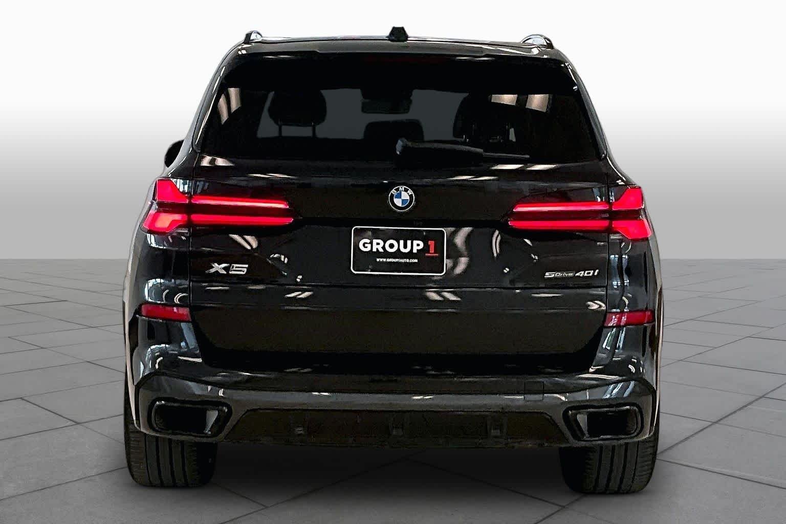 Used 2024 Black Sapphire Metallic BMW sDrive40i image 4