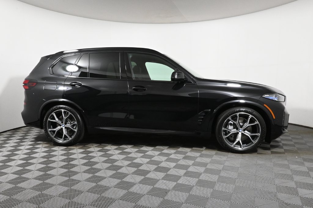 Used 2026 Black BMW xDrive50e image 8