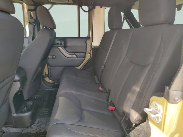 Used 2013 Green Jeep Unlimited Sport image 24