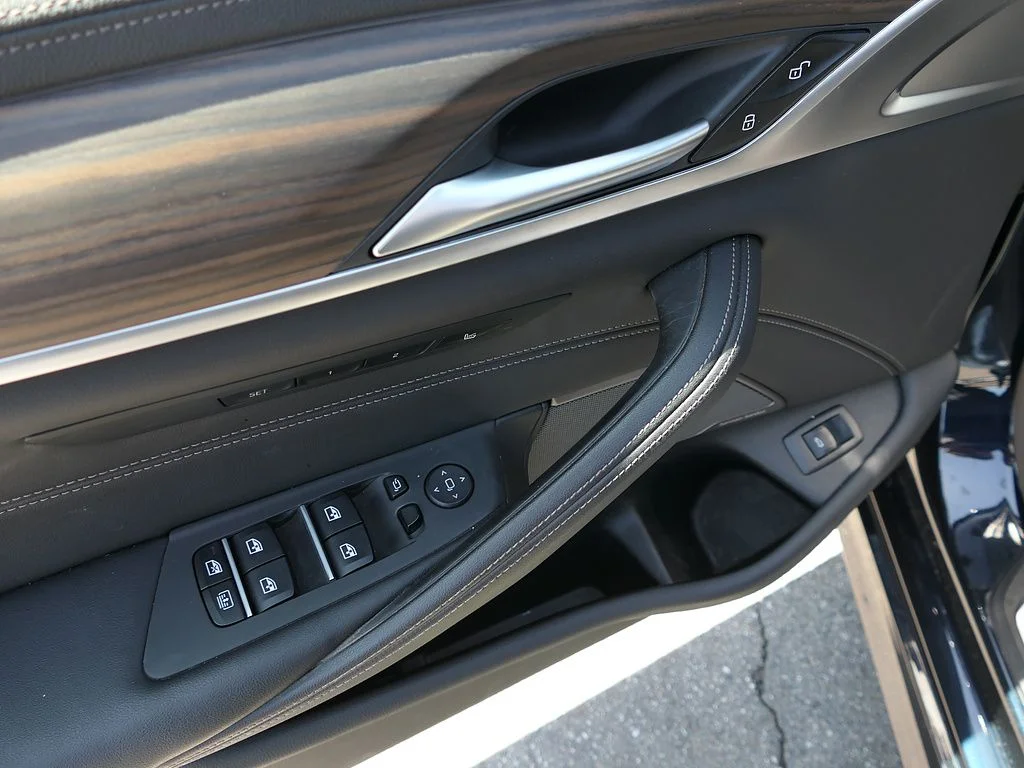 Used 2023 Carbon Black Metallic BMW M550i xDrive image 13