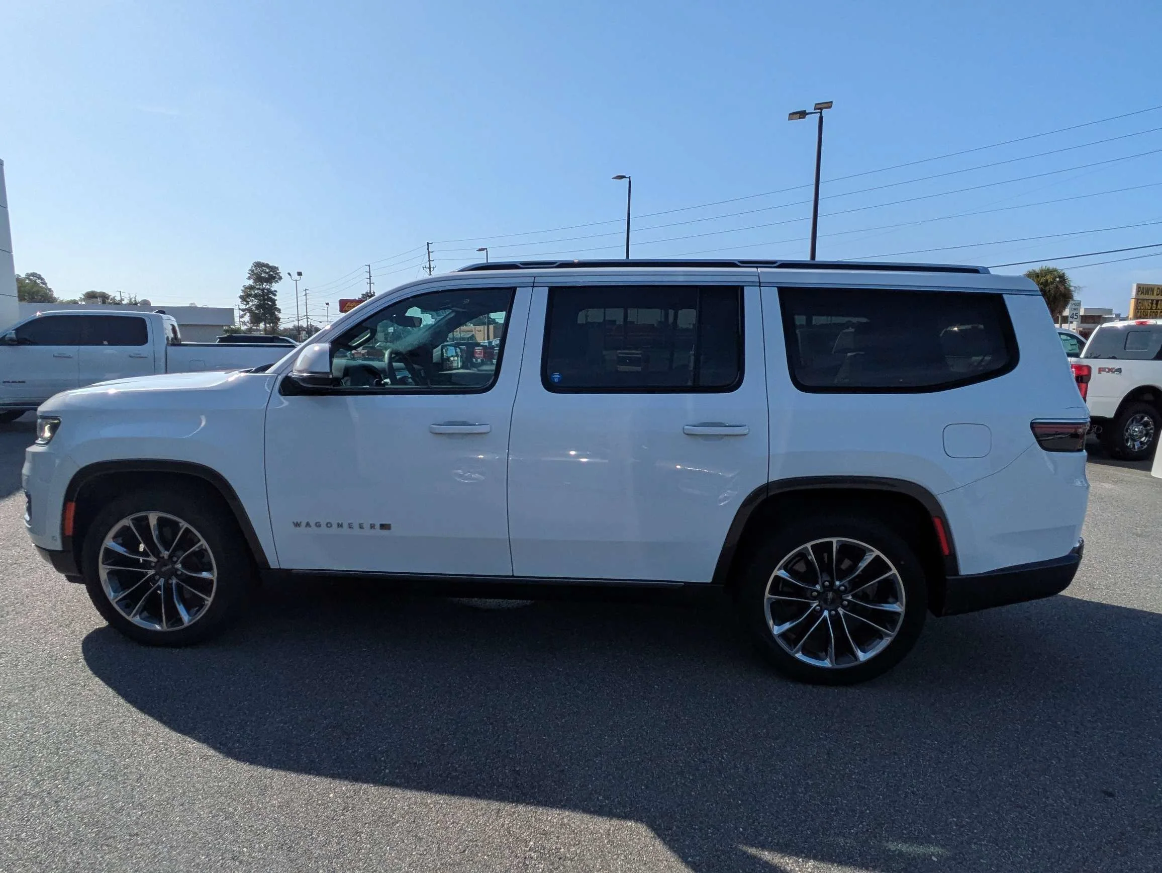 Certified Used 2022 Bright White Clearcoat Jeep Series III w/Leather Quad Buckets, Panoramic Moonroof, 10.25 Screen, & 3rd Row Seat image 7