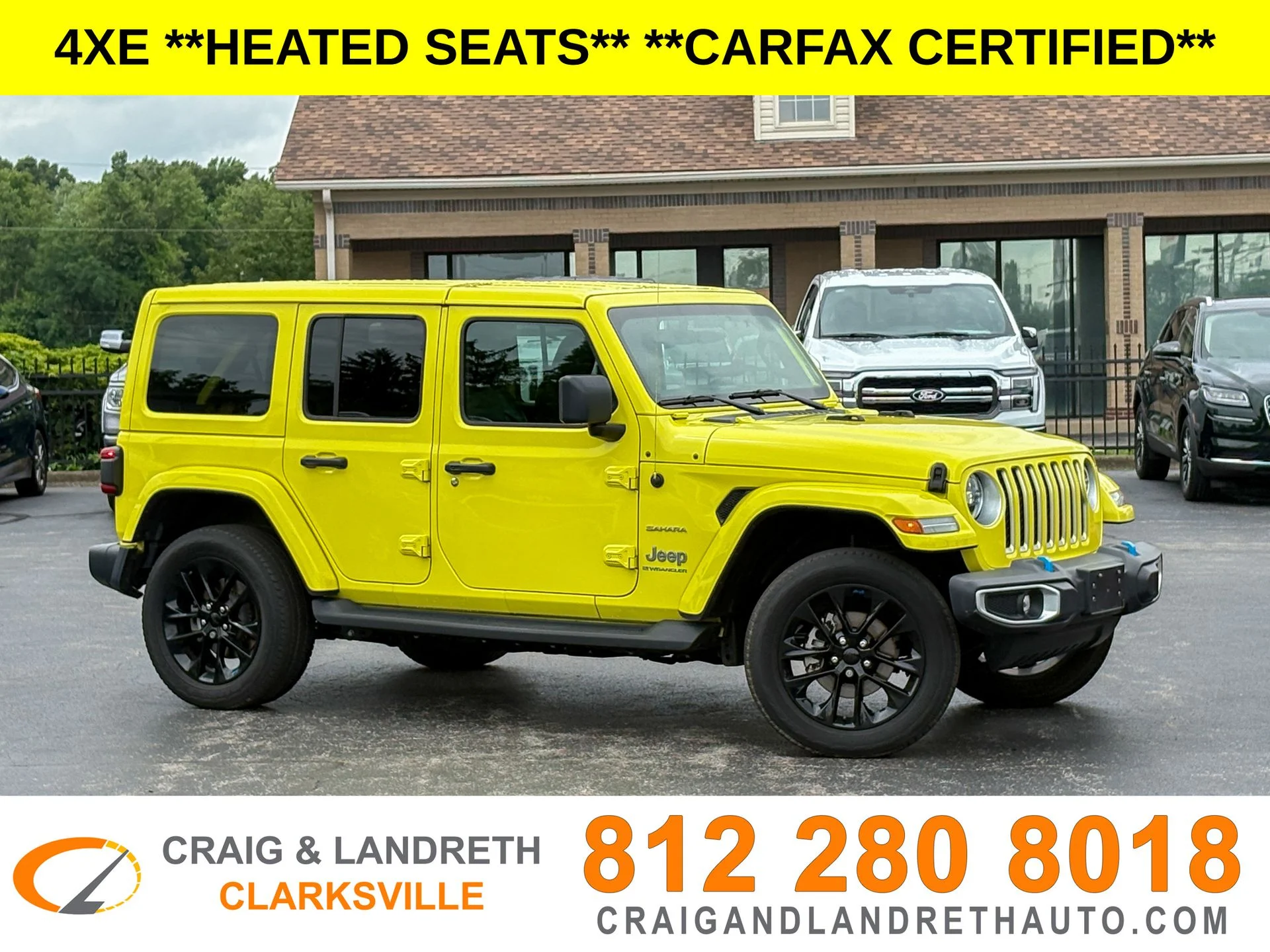 Used 2023 Yellow Jeep Sahara 4xe image 1