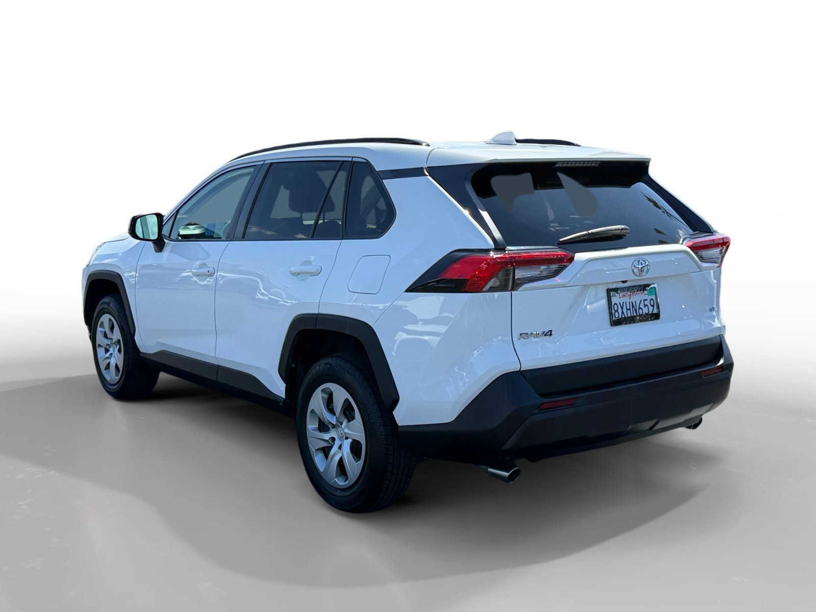 Used 2021 Super White Toyota LE image 3