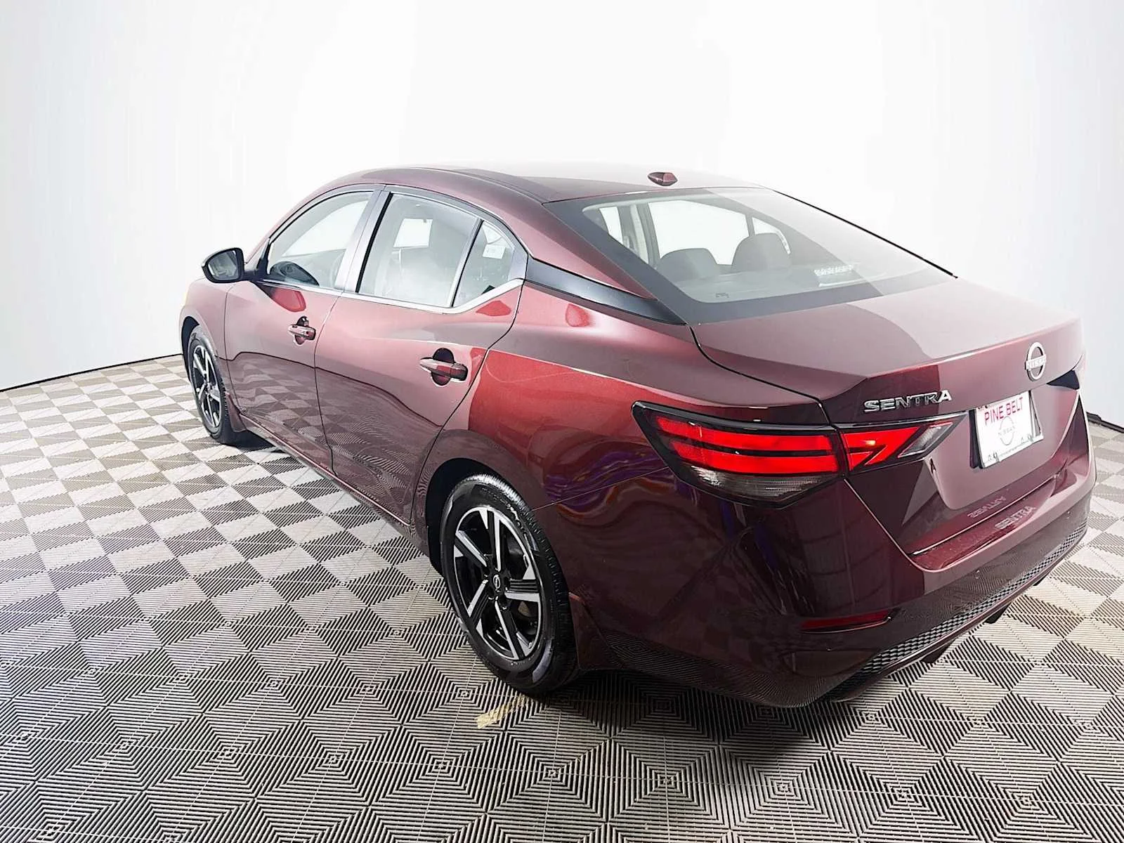 Used 2025 Rosewood Metallic Nissan SV image 6