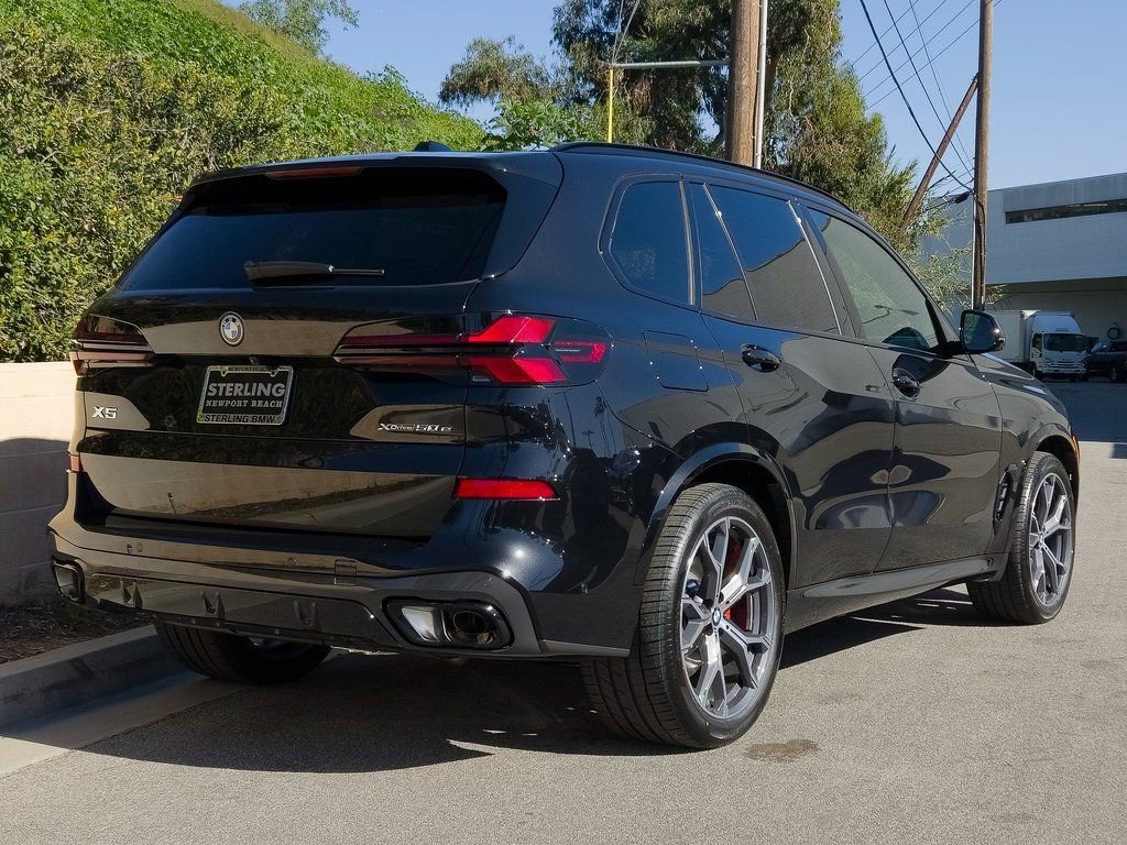 New 2026 Black Sapphire Metallic BMW xDrive50e image 5