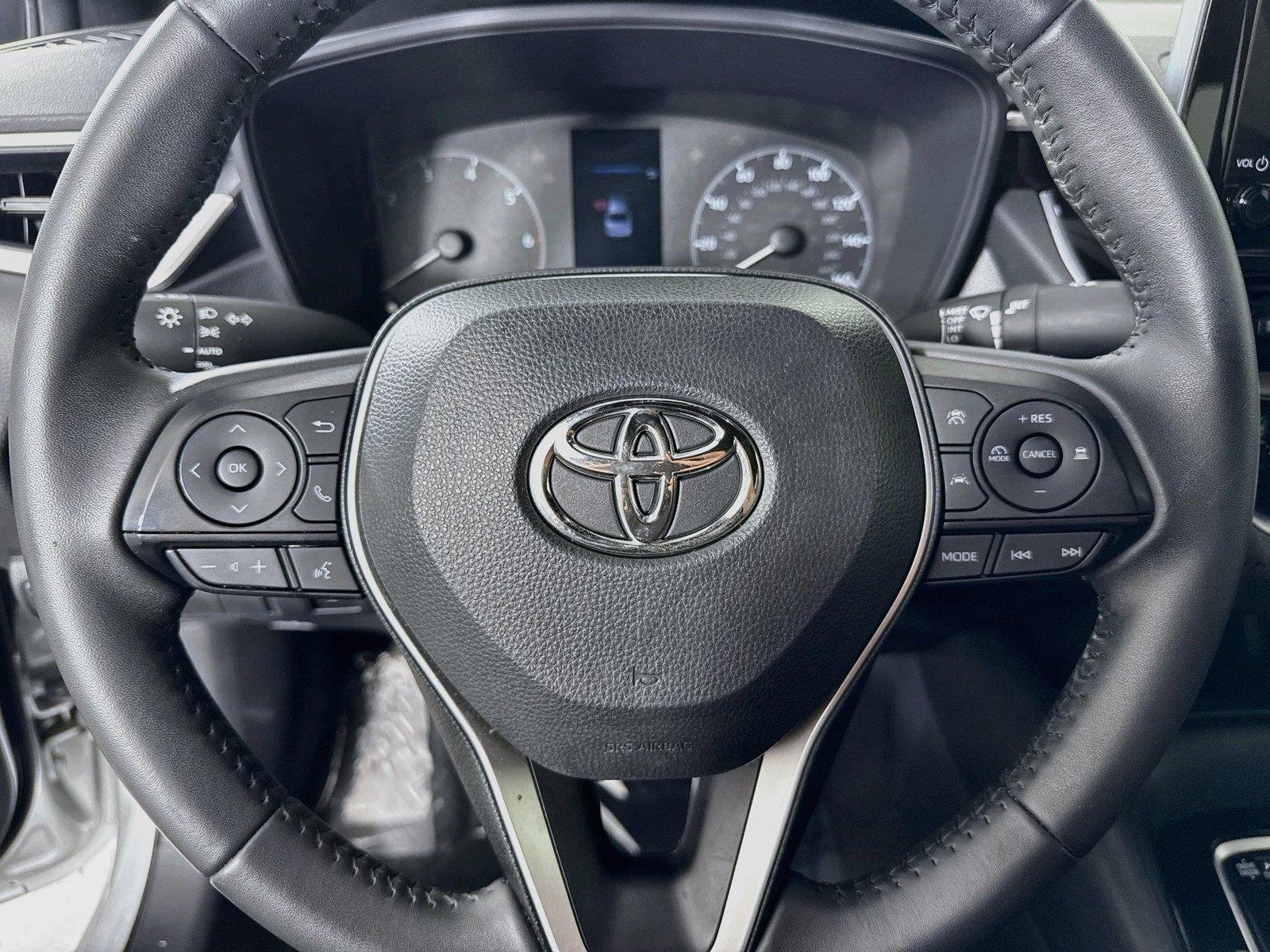Used 2024 Classic Silver Metallic Toyota Hybrid SE image 16
