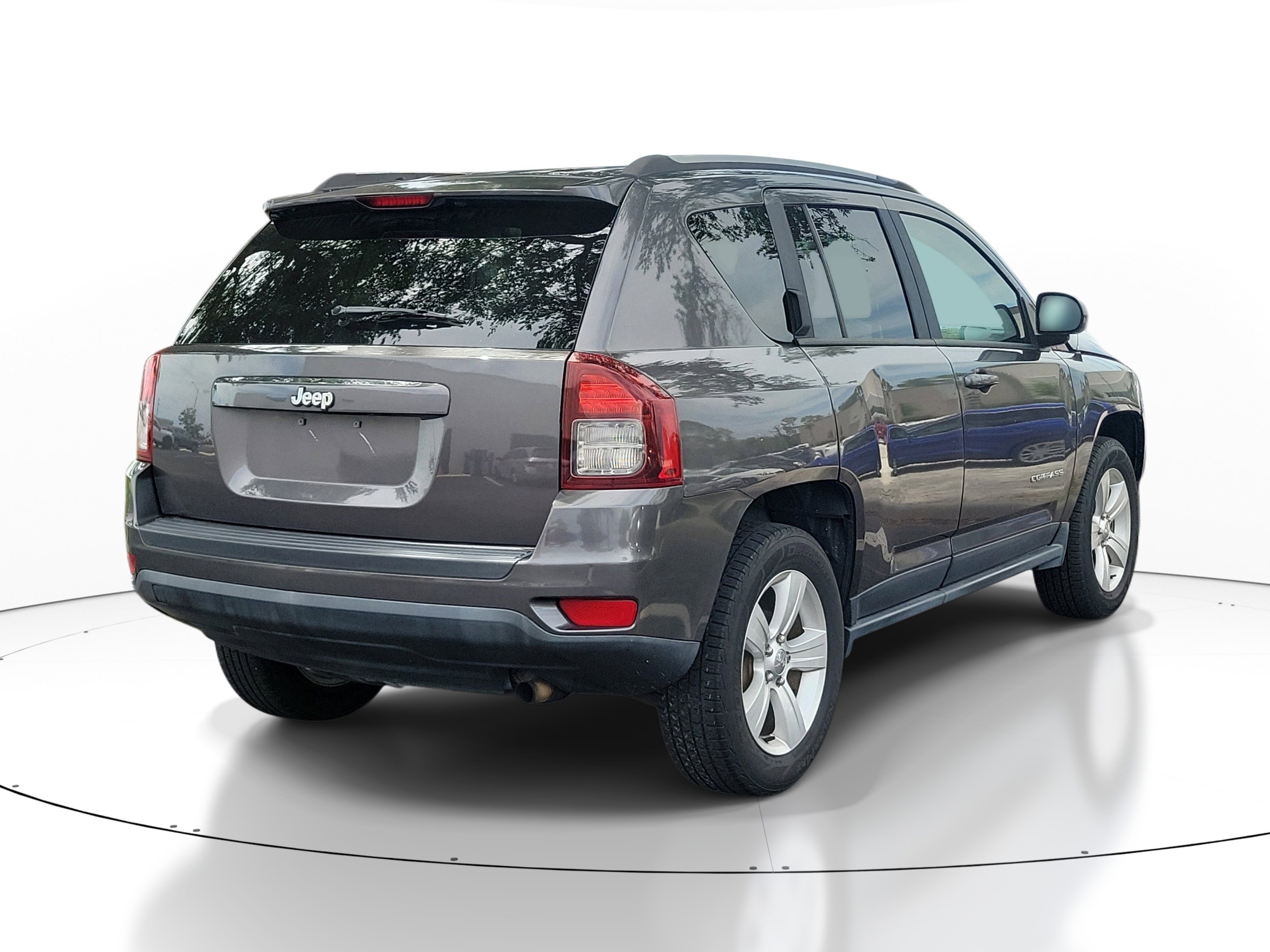 Used 2015 Granite Crystal Metallic Clearcoat Jeep Sport image 10