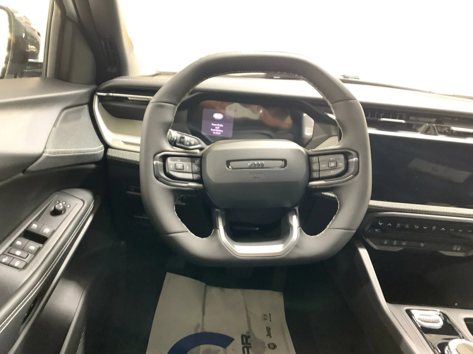 New 2026 Bright White Jeep Laredo image 13