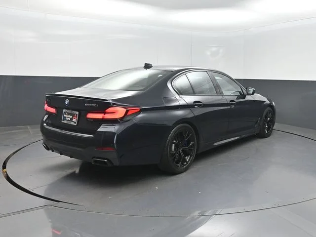 Used 2021 Black BMW M550i xDrive image 31