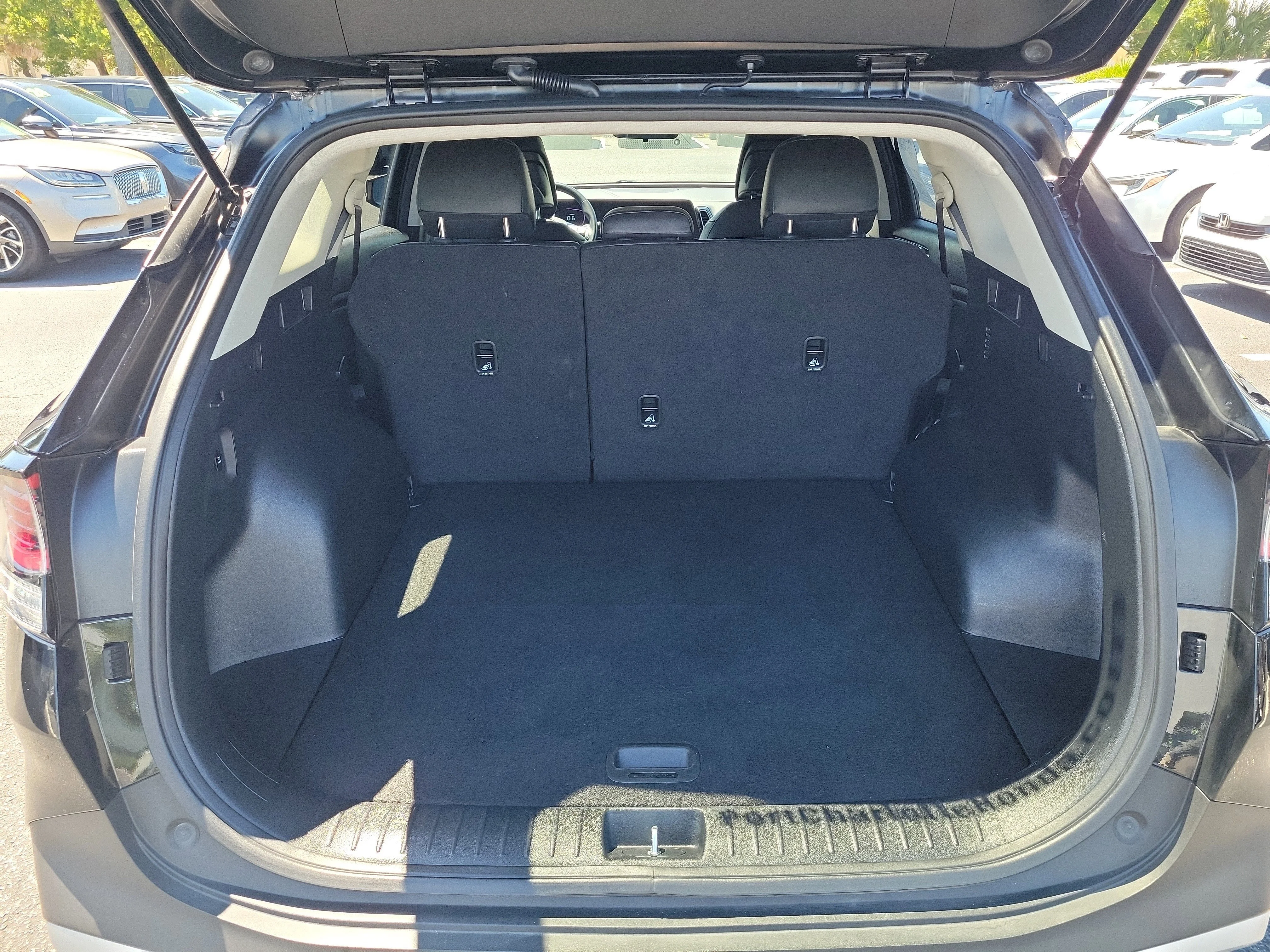 Used 2025 Ebony Black Kia EX image 11