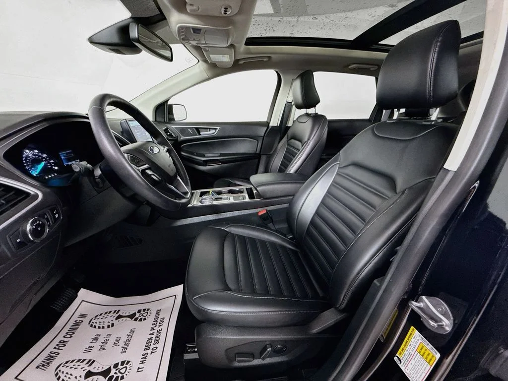 Used 2023 Agate Black Metallic Ford SEL image 2