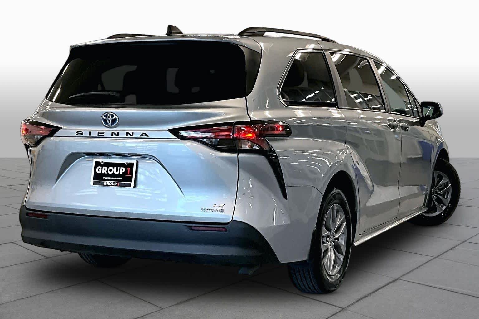 Used 2021 Celestial Silver Metallic Toyota LE image 12