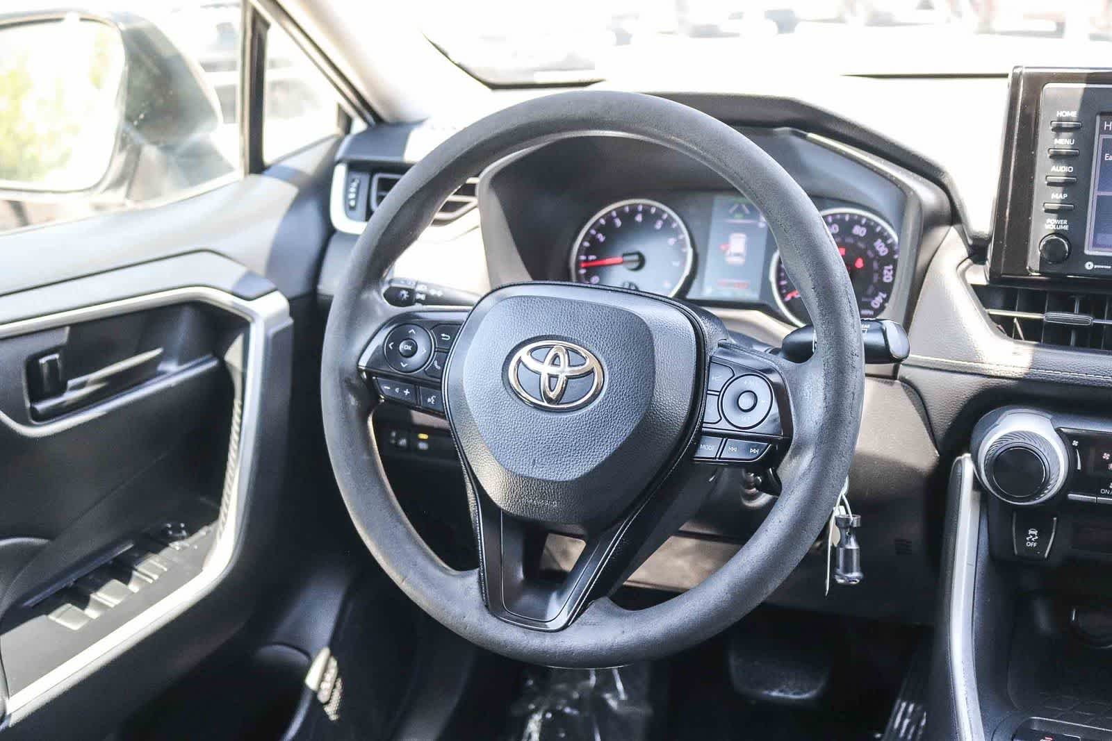 Used 2021 Super White Toyota LE image 13