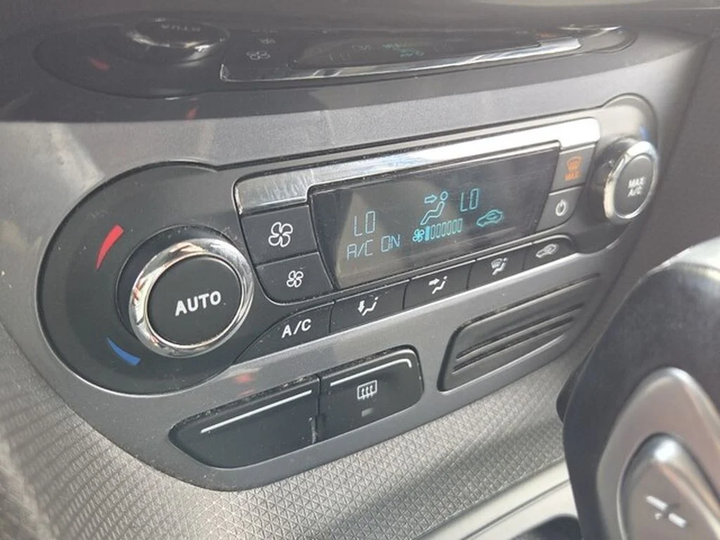 Used 2016 Magnetic Metallic Ford Titanium image 23