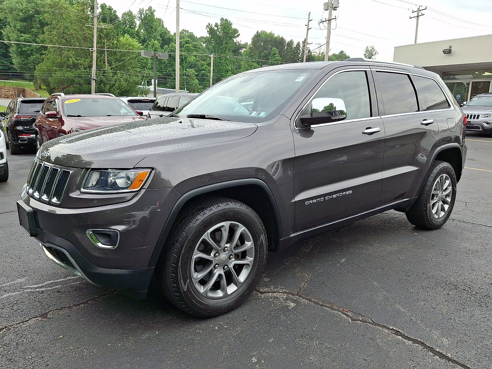 Used 2015 Granite Crystal Metallic Clearcoat Jeep Limited image 3