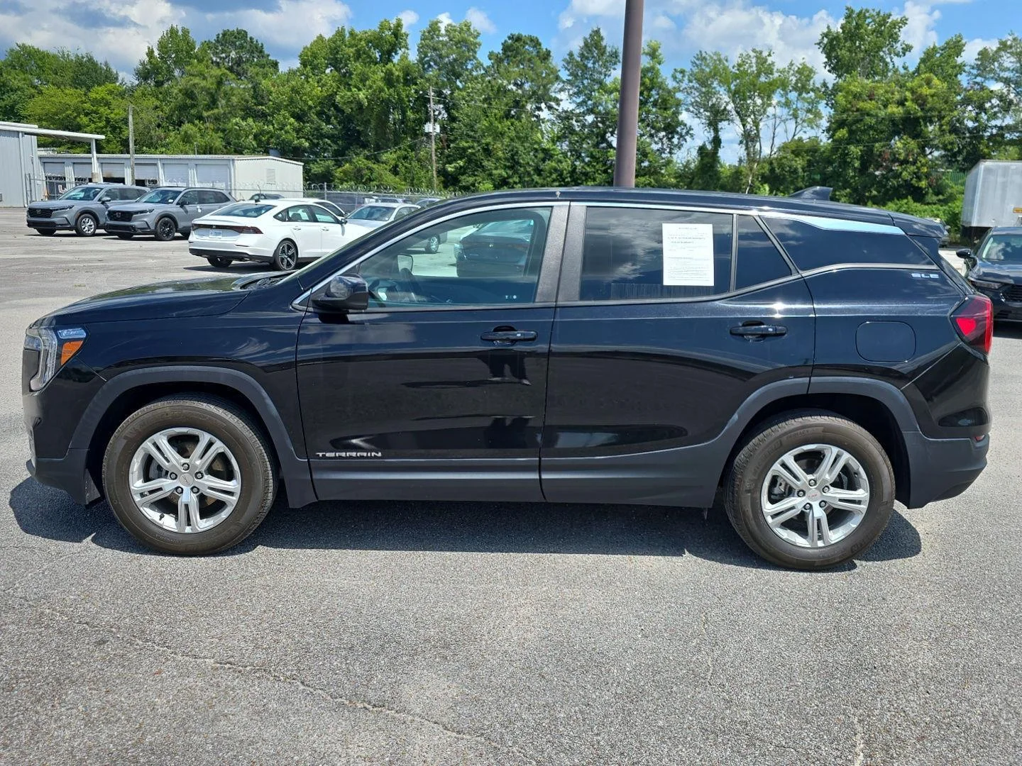 Used 2024 Ebony Twilight Metallic GMC SLE image 8