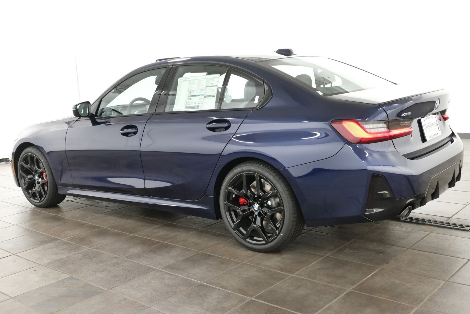 New 2026 Tanzanite Blue II Metallic BMW 330i xDrive image 3