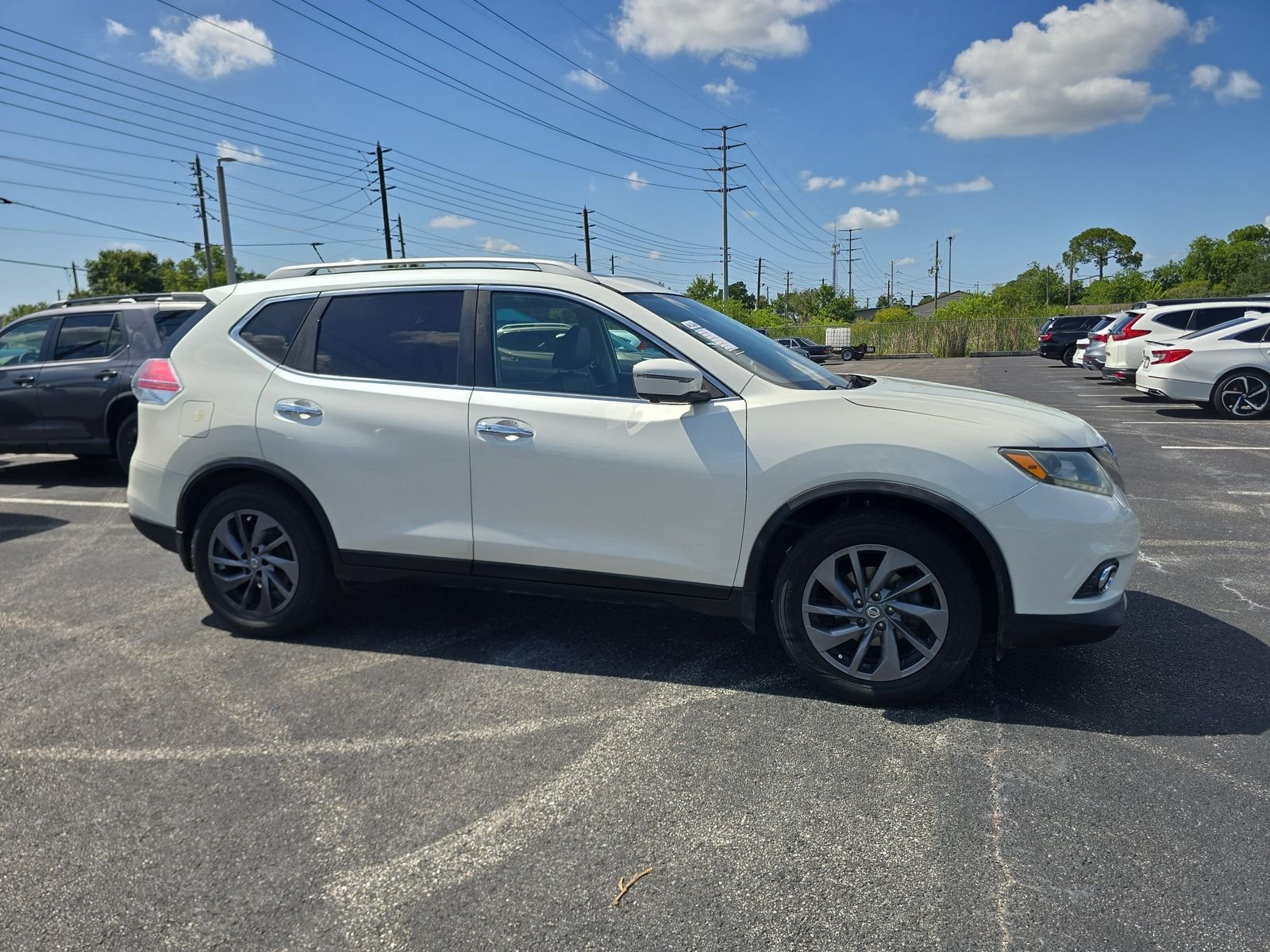 Used 2016 Nissan Rogue SL with VIN 5N1AT2MT0GC802600 for sale in Port Richey, FL