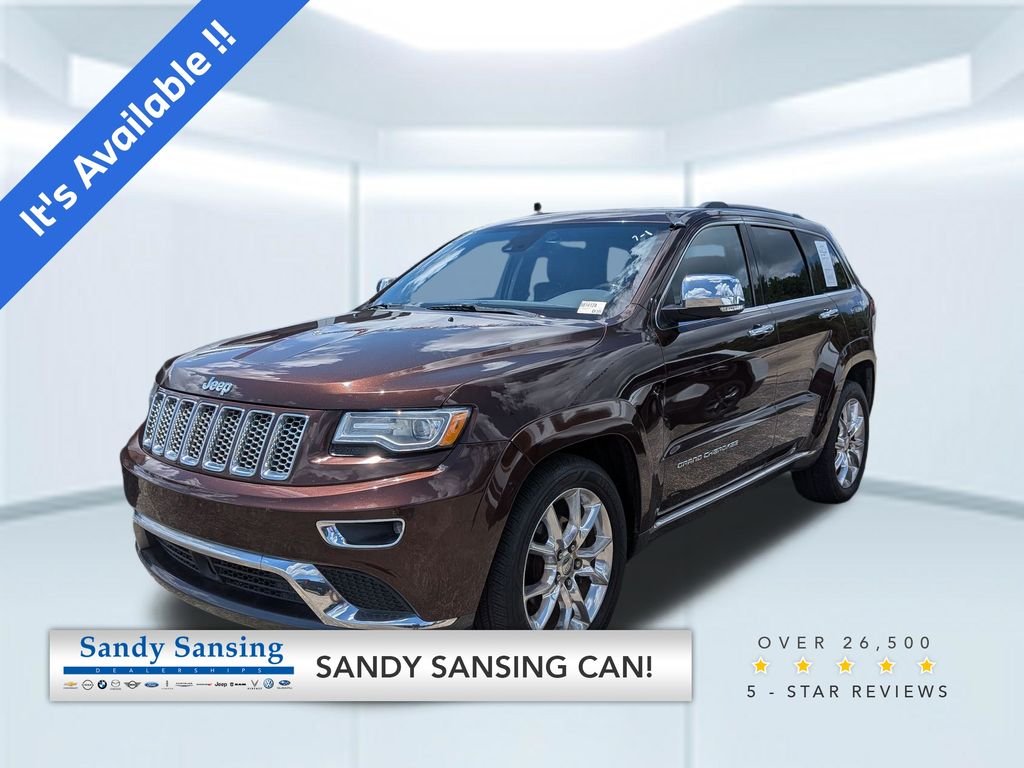 Used 2014 Red Jeep Summit image 1