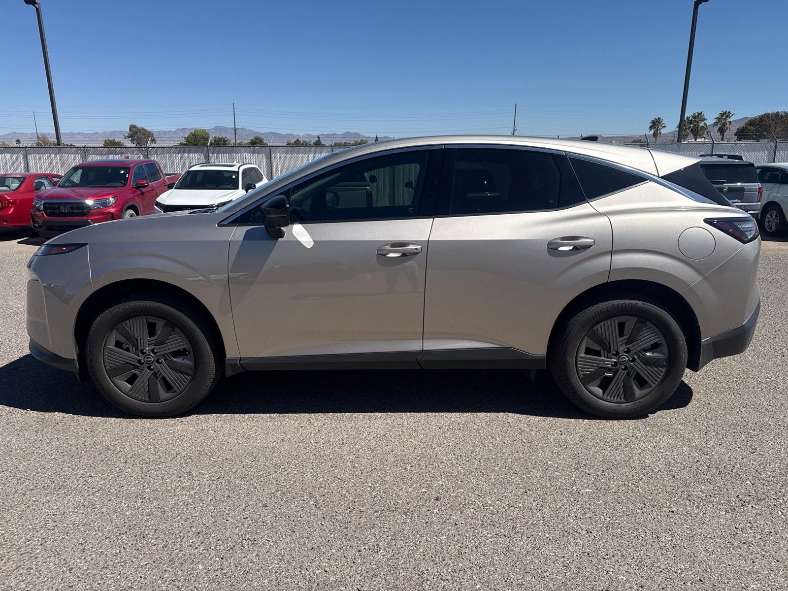 Used 2026 Champagne Silver Metallic Nissan SL image 2