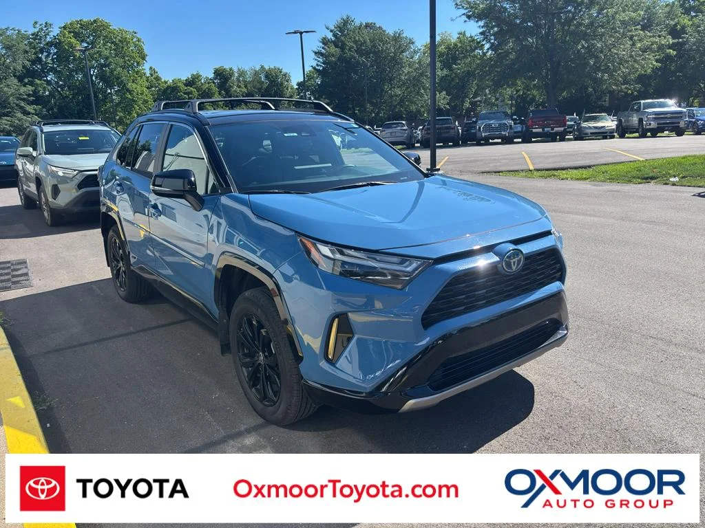 Used 2024 Cavalry Blue/Midnight Black Metallic Toyota Hybrid XSE image 1