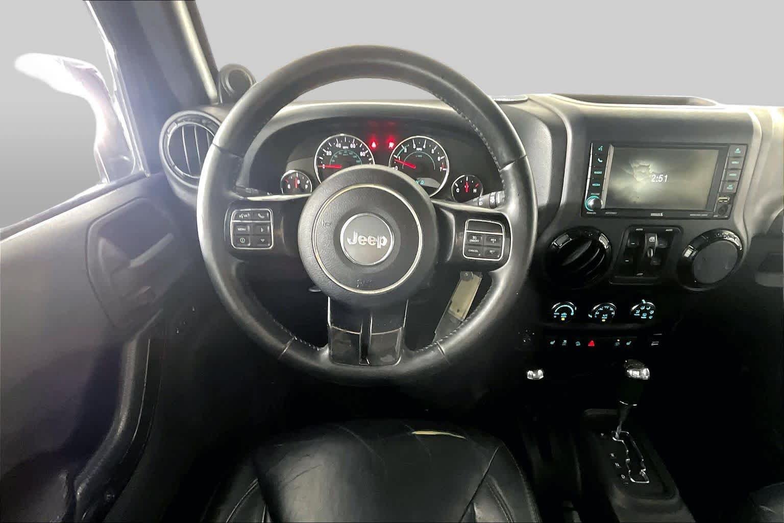 Used 2014 Black Clearcoat Jeep Altitude image 6