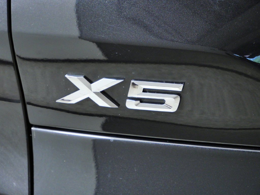New 2026 Black Sapphire Metallic BMW xDrive50e image 13