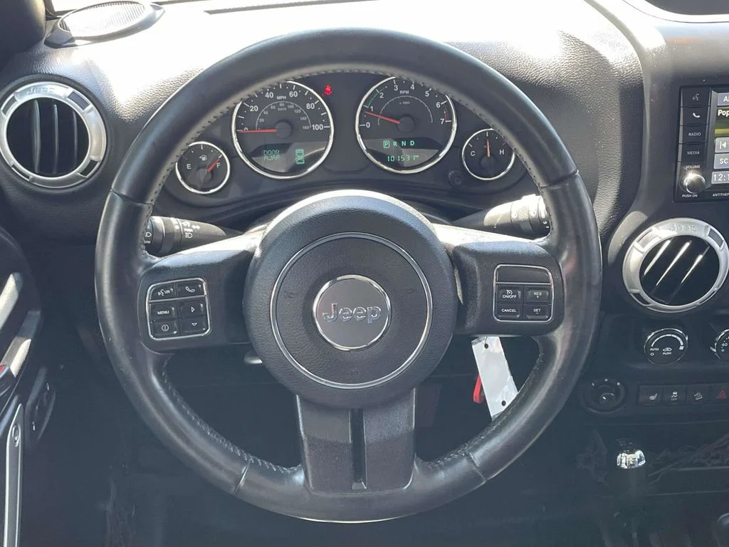 Used 2016 Black Jeep Unlimited Sahara image 22