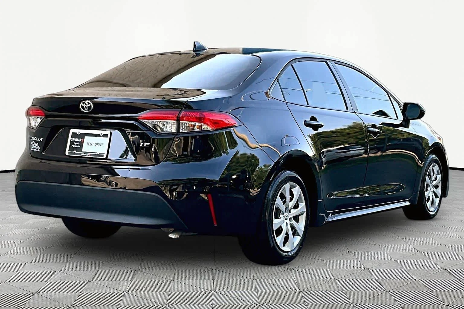 Used 2025 Midnight Black Metallic Toyota LE image 25