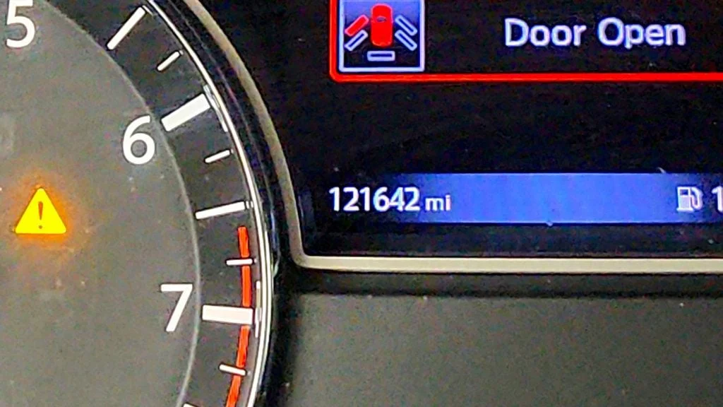 Used 2016 Gun Metallic Nissan 4WD 4dr SV image 14