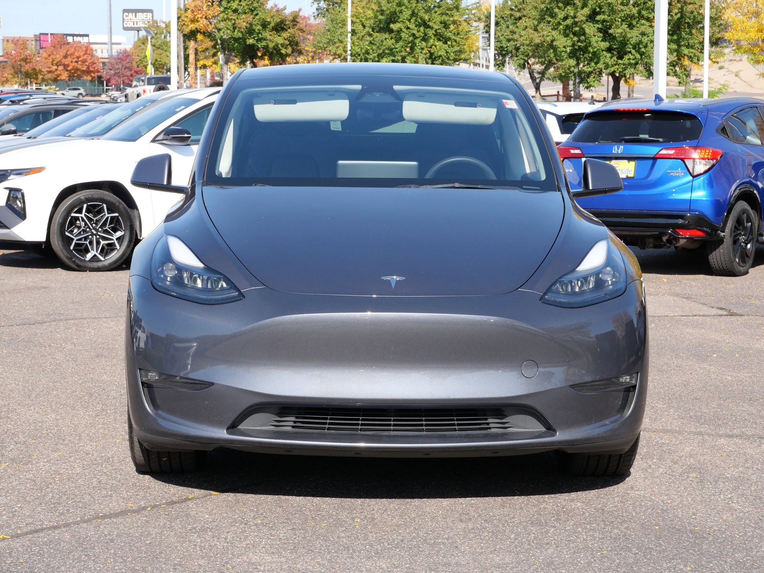 Used 2023 Tesla Model Y Long Range with VIN 7SAYGDEEXPF881086 for sale in St. Louis Park, MN