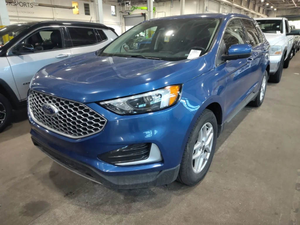 Used 2024 Atlas Blue Metallic Ford SEL image 1