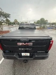Used 2024 Black GMC Denali image 1