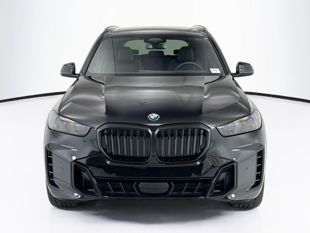 New 2026 Black Sapphire Metallic BMW sDrive40i image 2