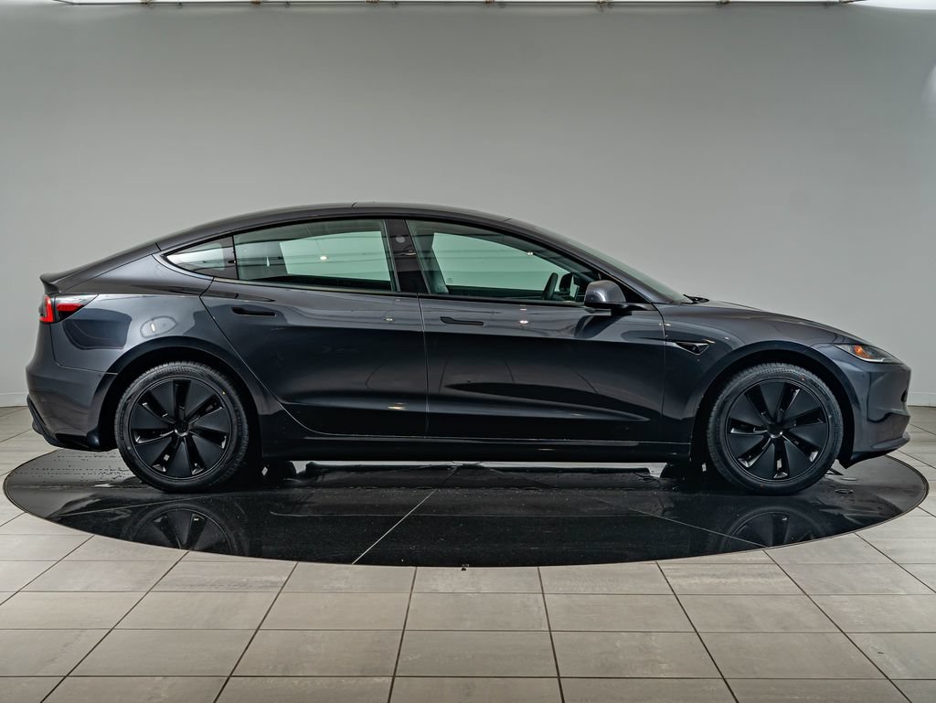 Used 2024 Stealth Gray Tesla  image 4