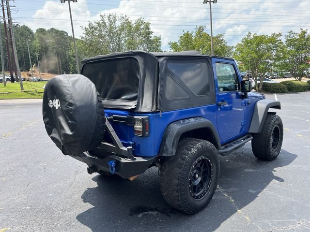 Used 2014 Flame Red Clearcoat Jeep Sport image 7